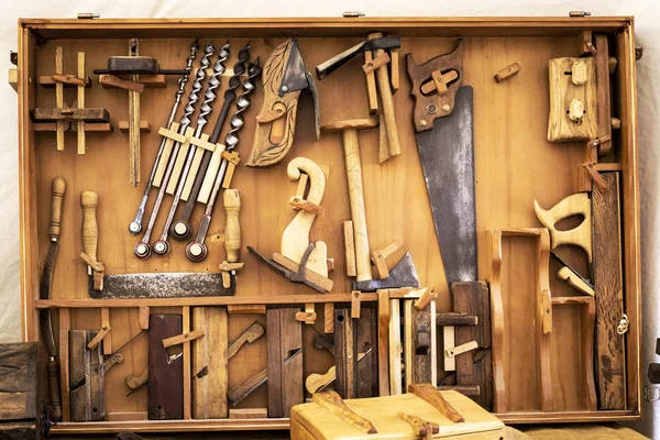 old carpenter\'s manual tools in an old carpentry shop