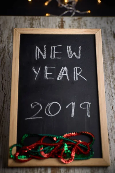 Black Chalkboard Written Words New Year 2019 Surrounded Small Lights — Stock Photo, Image