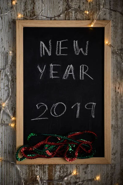 Black Chalkboard Written Words New Year 2019 Surrounded Small Lights — Stock Photo, Image