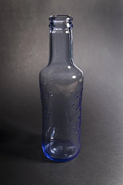 Garrafa de água azul vazia — Fotografia de Stock