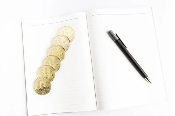 Several Bitcoin Gold Coins Next Pen Blank Notebook — Stock Photo, Image