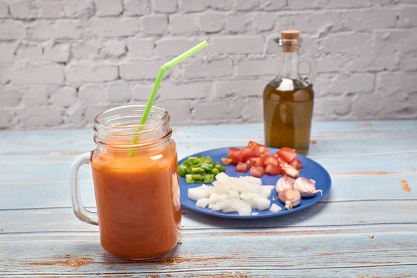 View of a fresh pitcher of red gazpacho — Stock Photo, Image