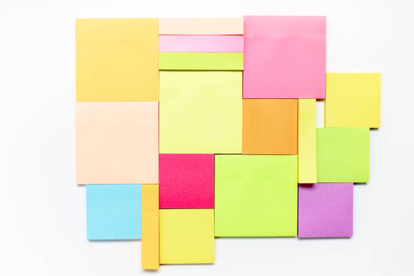 Group of empty coloured post-its as background. Brainstorming concept, background and design