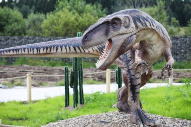Dinozorlar Park. Bir dinazor doğa arka plan üzerinde. Oyuncak d