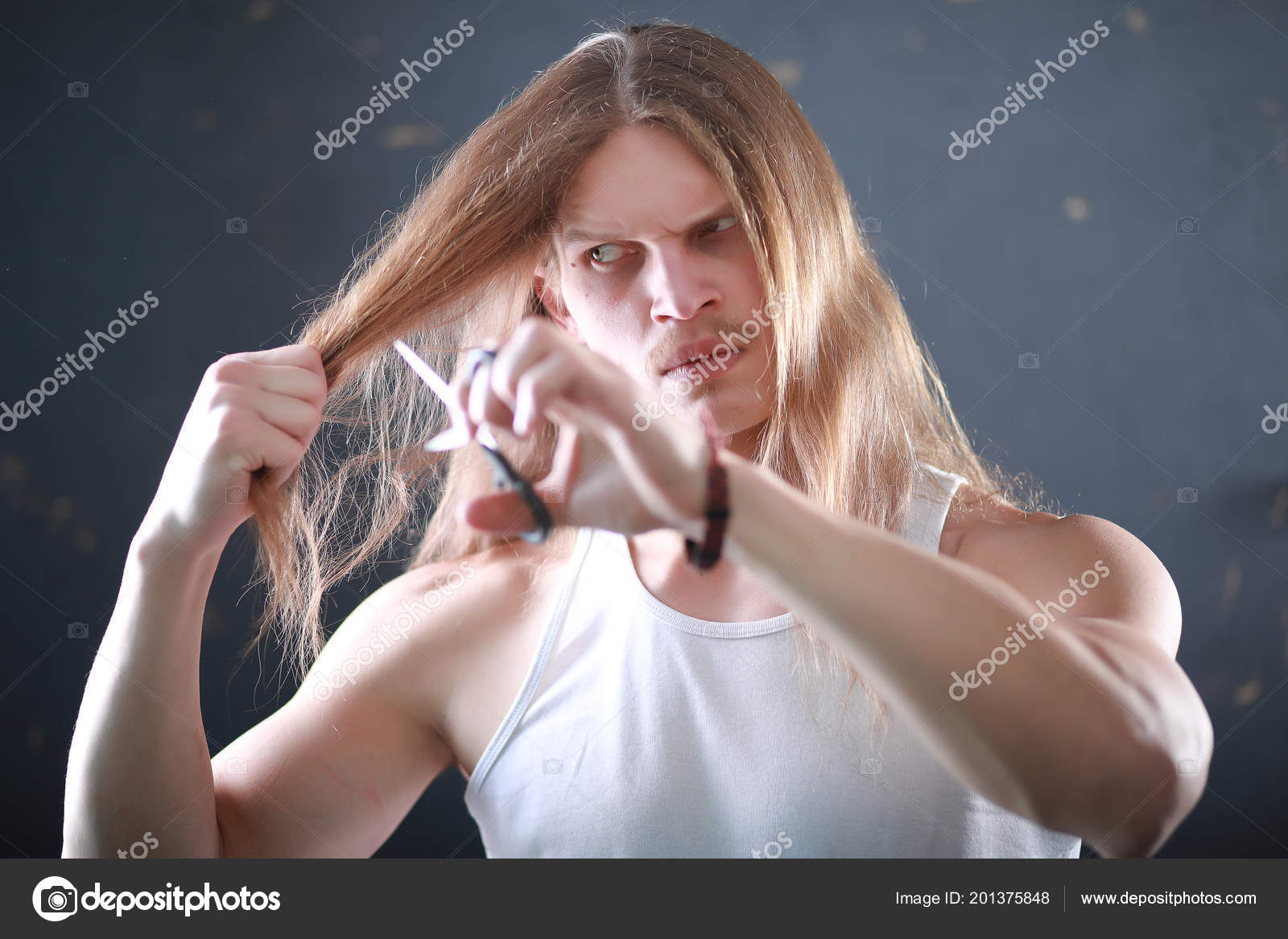 A Young Man With Long Hair Cut A Lock Stock Photo C Alexkich