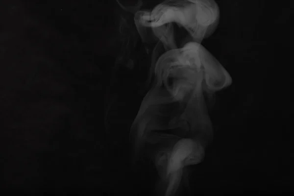 White smoke on a black background. Texture of smoke. Clubs of wh — Stock Photo, Image