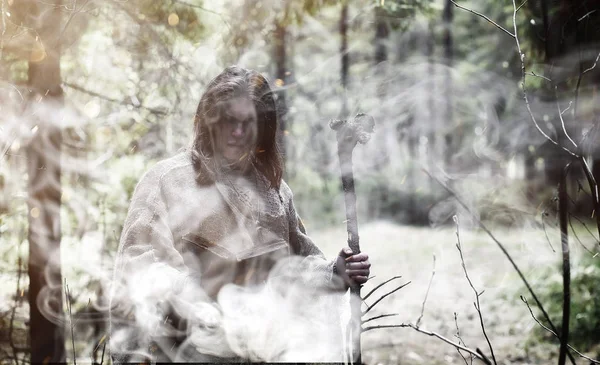 Fairy magician. A sorcerer with a glass sphere, a magical spell — Stock Photo, Image