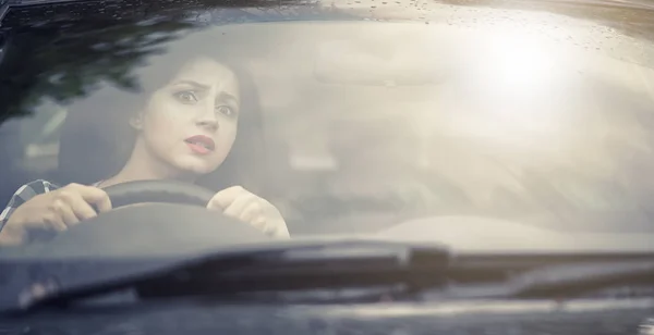 Girl driving a car bad emotions — Stock Photo, Image