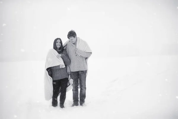 A loving couple on a winter walk. Man and woman on a date in the — Stock Photo, Image