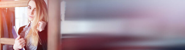 Young pretty blonde girl student