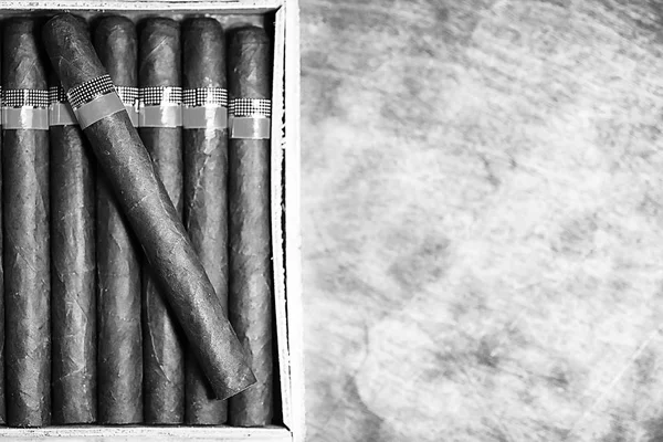 Monochrome photo of large wooden box of cigars handmade Cuban — Stock Photo, Image