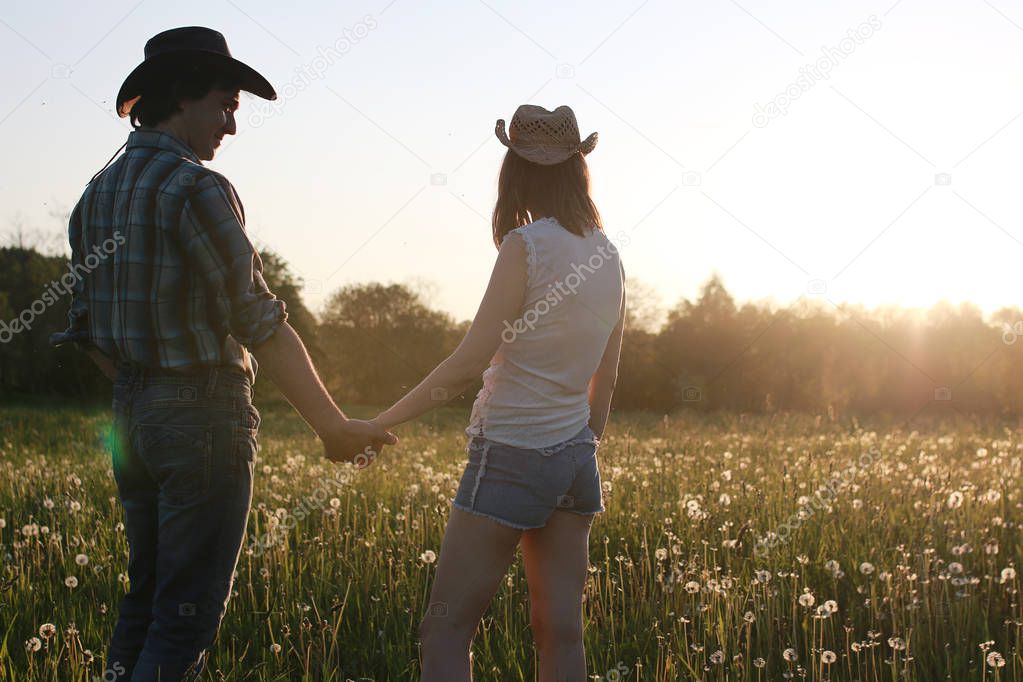 Cute couple on a walk by the countryside