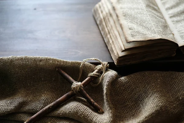 Religion tom book cross burlap — Stock Photo, Image