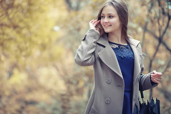 stock image Young girl in a coat in autumn  park