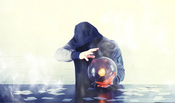 A man with a fortune teller ball — Stock Photo, Image