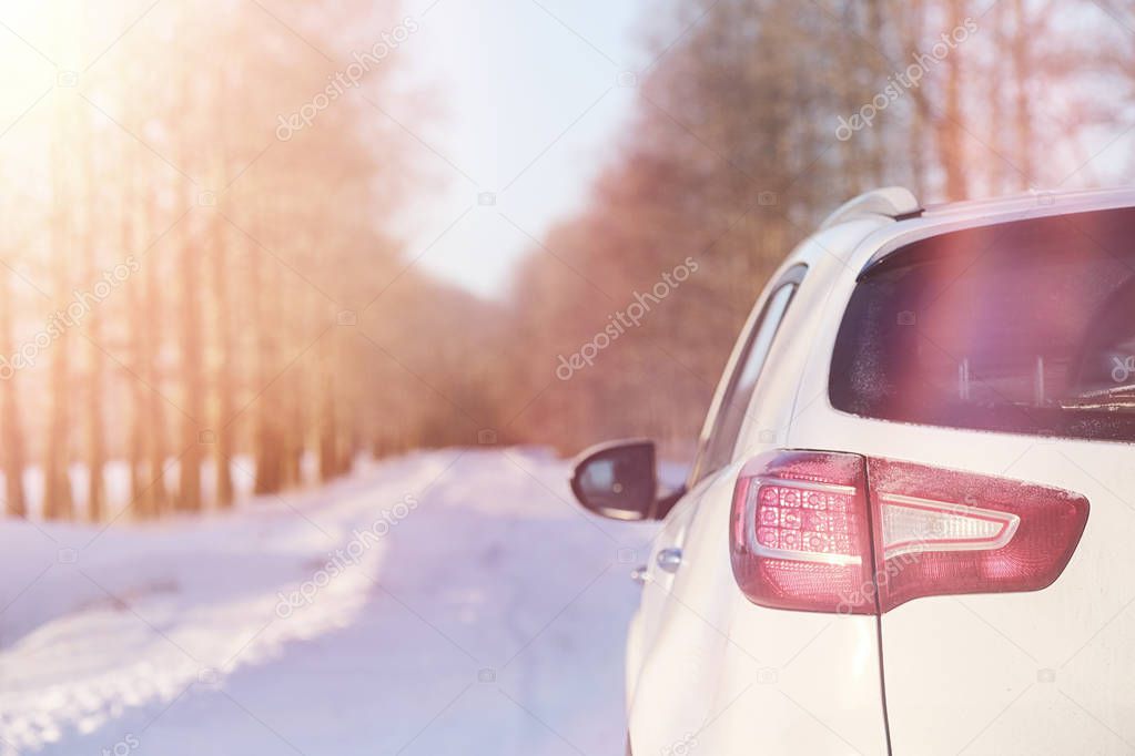 Winter road and a car