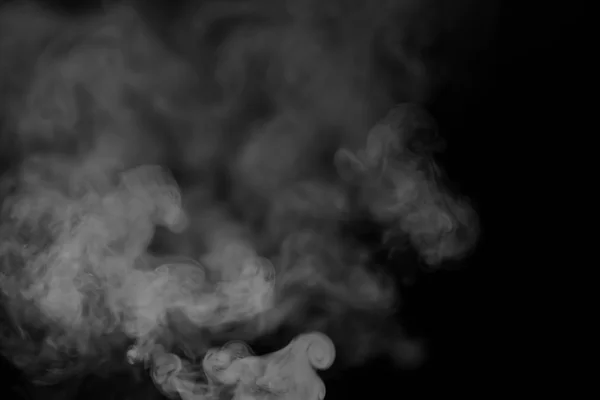 White smoke on a black background. Texture of smoke. Clubs of wh