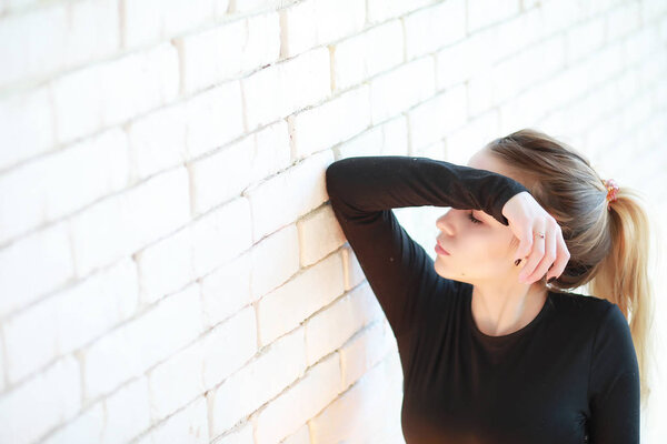 A young girl rests in a cozy room