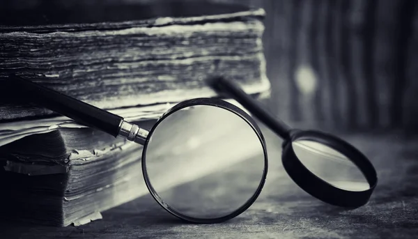 An old retro book on the table. An encyclopedia of the past on a — Stock Photo, Image