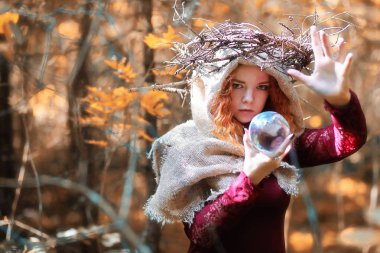 Fortune-teller conducts a ritual autumn clipart