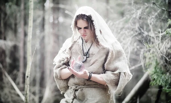 Fairy magician. A sorcerer with a glass sphere, a magical spell — Stock Photo, Image