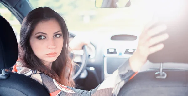 Girl driving a car bad emotions — Stock Photo, Image