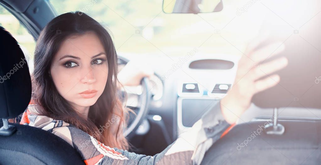 Girl driving a car bad emotions