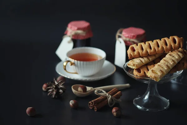 Set for breakfast. Sweets and pastries with nuts for tea on a bl — Stock Photo, Image