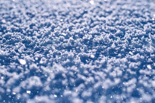 Texture of ice in winter. Pieces of frozen water on a street in — Stock Photo, Image