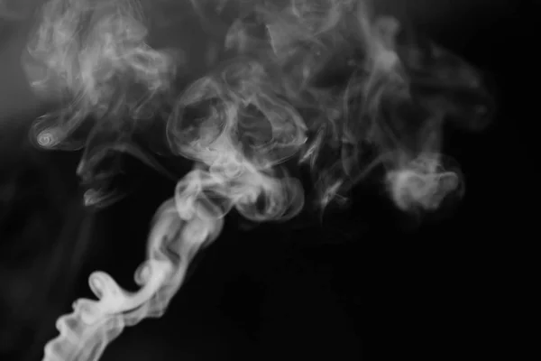 White smoke on a black background. Texture of smoke. Clubs of wh — Stock Photo, Image