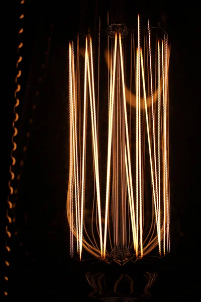 Lamps with tungsten filament. Edison's light bulb. Filament fila