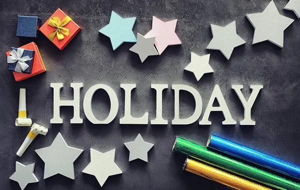 Background concept. The inscription holiday on a dark background — Stock Photo, Image