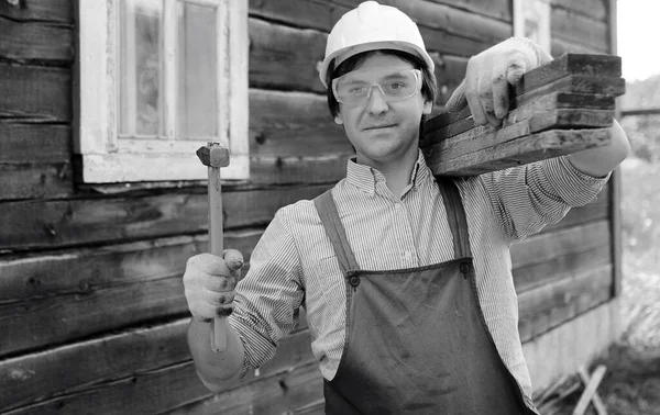 Mann in Arbeiterkleidung schwarz-weiß — Stockfoto