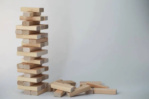 Board game jenga tower of wood sticks — Stock Photo, Image