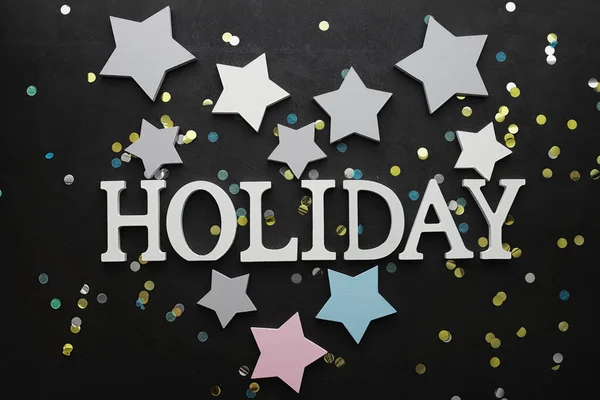 Background concept. The inscription holiday on a dark background — Stock Photo, Image