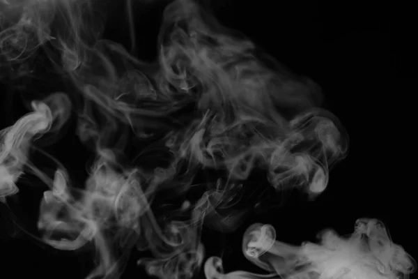 White smoke on a black background. Texture of smoke. Clubs of wh — Stock Photo, Image