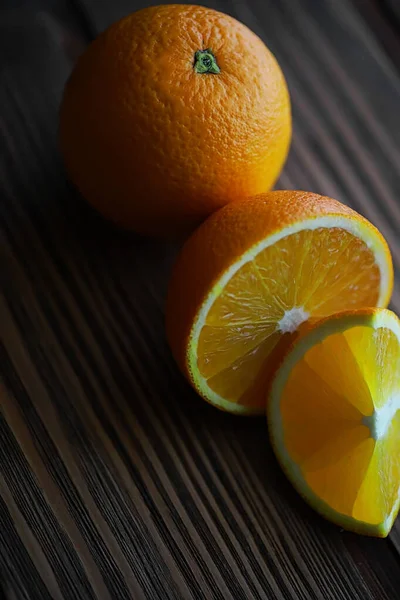 Orange citrus fruit on a stone table. Orange background. — Stock Photo, Image