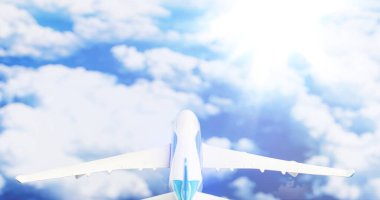 Uçak bulutların üstünde uçuyor..