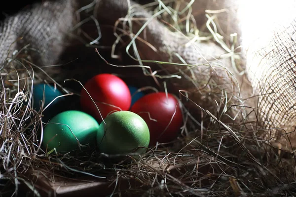 Easter painted eggs on burlap