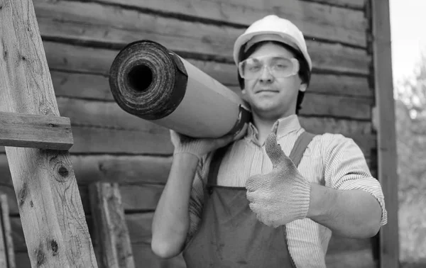 Man in worker's clothes black and white — Stock Photo, Image