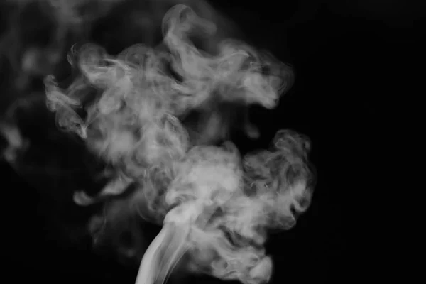 White smoke on a black background. Texture of smoke. Clubs of wh — Stock Photo, Image