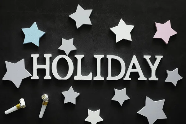 Background concept. The inscription holiday on a dark background — Stockfoto
