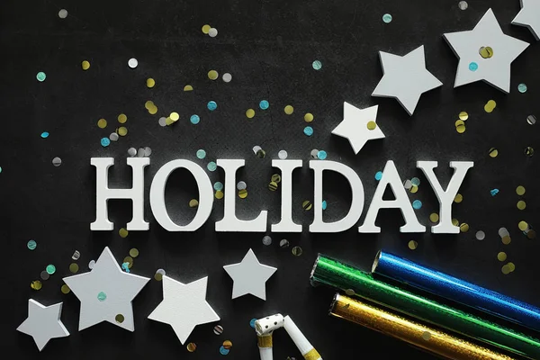 Background concept. The inscription holiday on a dark background — Stock Photo, Image