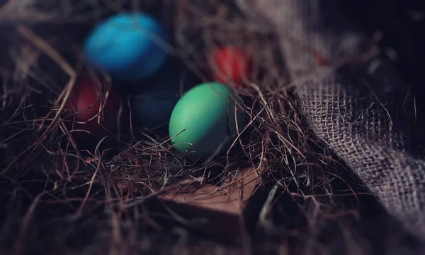 Easter painted eggs on burlap