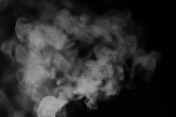 White smoke on a black background. Texture of smoke. Clubs of wh — Stock Photo, Image