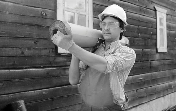 Man in worker 's clothes black and white — стоковое фото