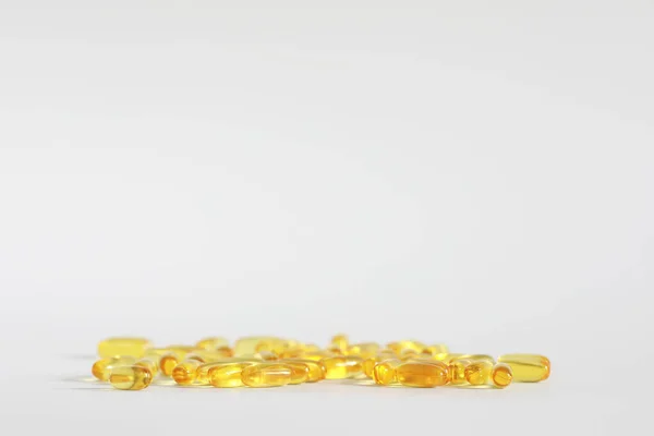 의료 마약 노란 색상의 투명 캡슐 — 스톡 사진