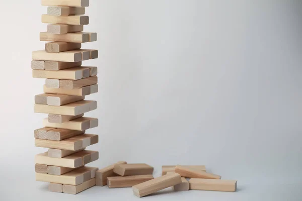 Board game jenga tower of wood sticks — Stock Photo, Image