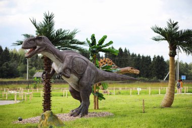 Dinozorlar Park. Bir dinazor doğa arka plan üzerinde. Oyuncak d
