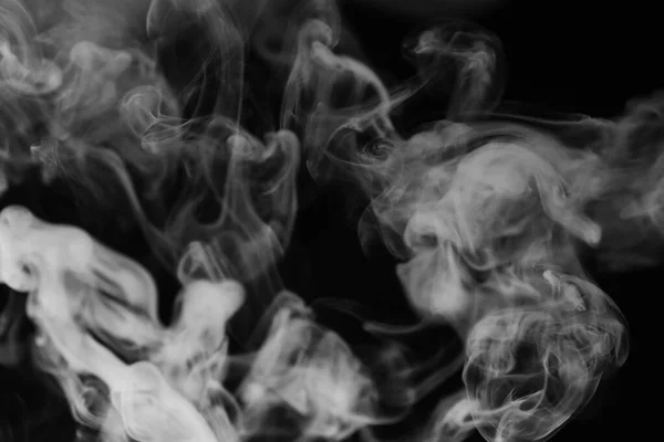 White smoke on a black background. Texture of smoke. Clubs of wh — Stock Photo, Image